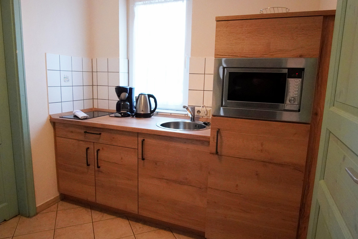 Landgasthof und Landhotel Heidekrug Cotta - Appartement mit Küchenzeile